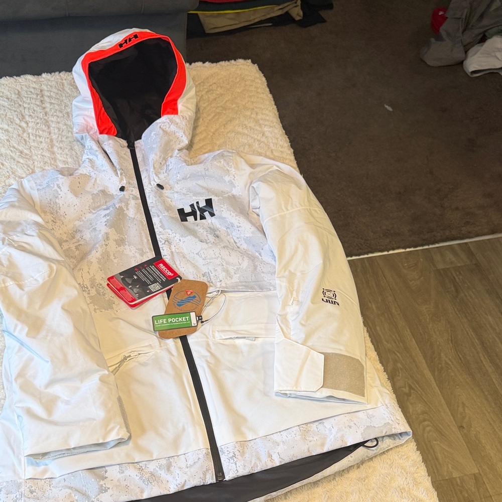 Helly Hansen Powchaser 2.0 Jacket in the "Grey Fog / Snow Camo" colorway.